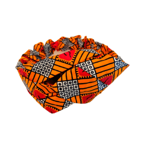 Bandeau orange cousu main en tissu wax, porté habituellement par des femmes noires africaines pour maintenir leur cheveux. Très utilisé, ce produit est un accessoire capillaire très apprécié